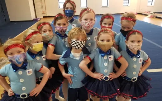 a group of children wearing clothing