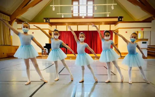 a group of girls dancing