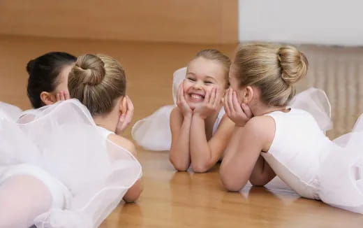 a group of people sitting on the floor