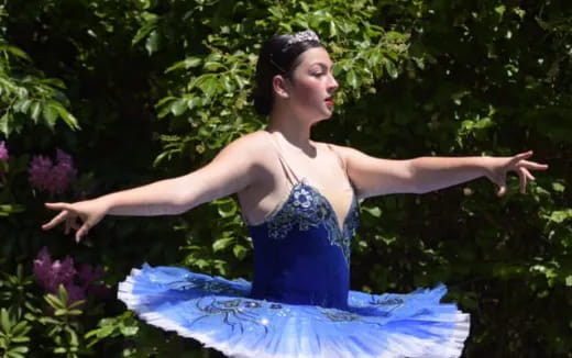 a person in a blue dress