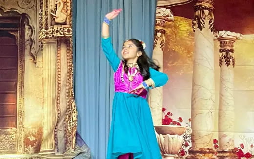 a person in a blue dress