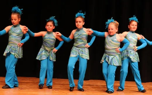 a group of children dancing