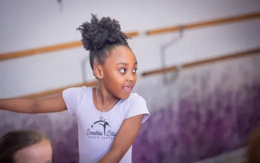 a young boy with curly hair