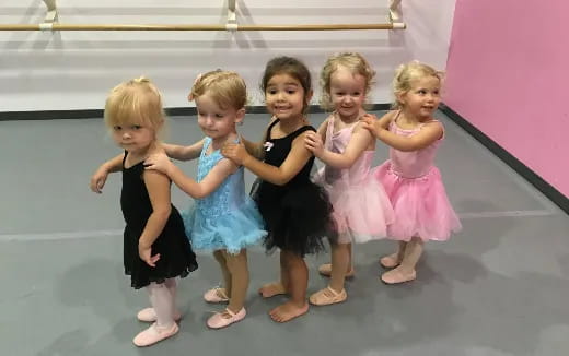a group of children posing for a photo