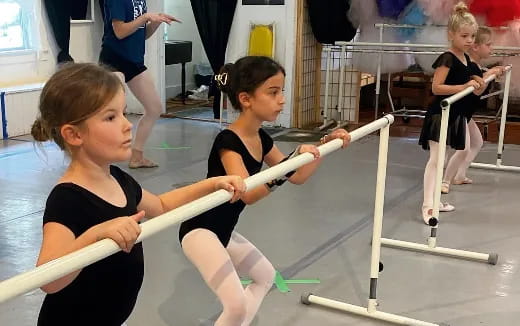a group of girls practicing karate