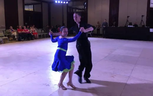 a man and woman dancing