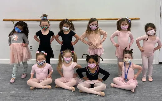 a group of girls wearing clothing