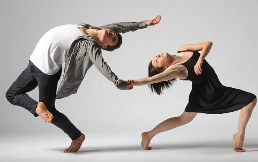 a man and woman dancing