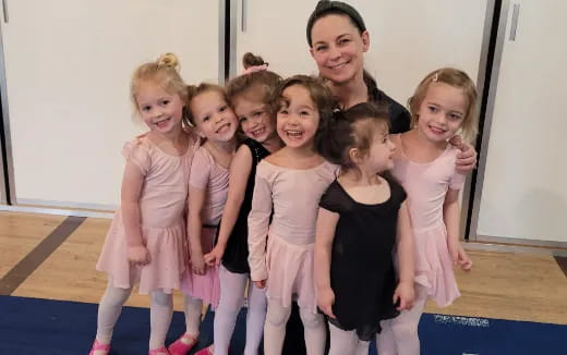 a person and a group of girls