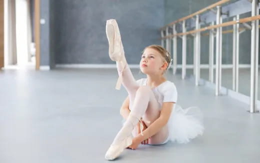 a woman sitting on the floor