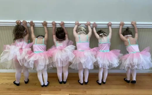 a group of girls dancing