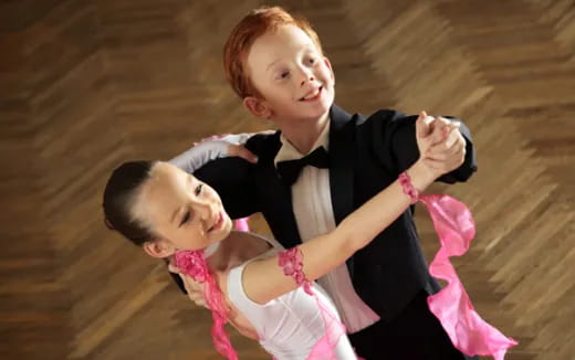 a boy holding a girl