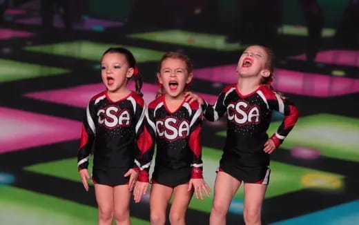 a group of girls in sports uniforms