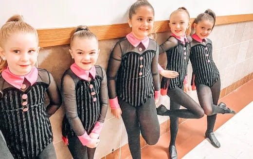 a group of children posing for a photo