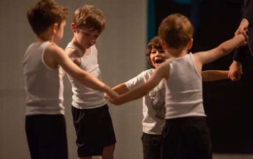 a group of children dancing