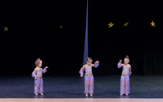 a group of children on a stage