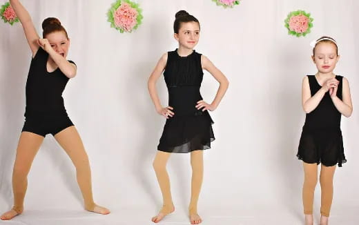 a group of women posing for a picture
