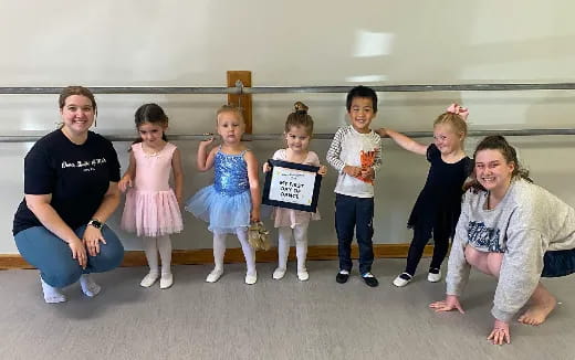 a group of people posing for a photo