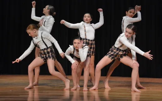 a group of children dancing