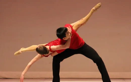 a man and woman dancing