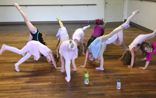 a group of people doing yoga