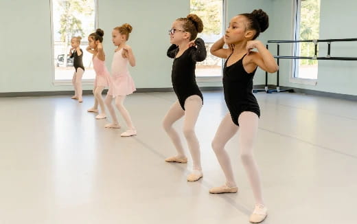 a group of girls dancing