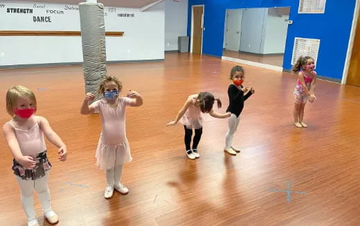 a group of children dancing