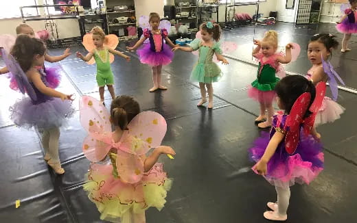 a group of children dancing