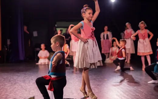 a group of children dancing