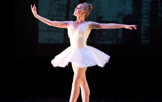 a woman dancing on a stage