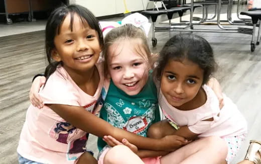 a group of girls smiling