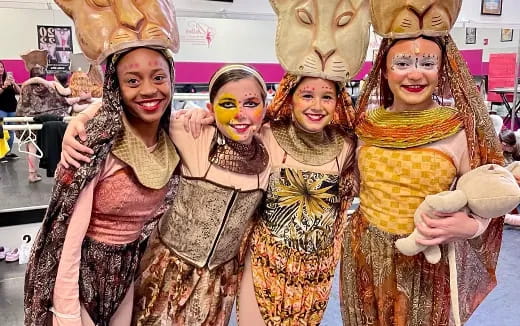 a group of women wearing clothing