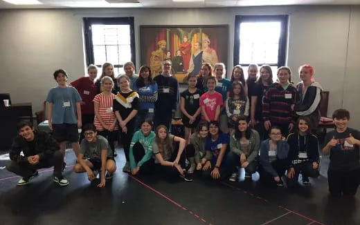 a group of people posing for a photo