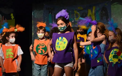 a group of children wearing clothing