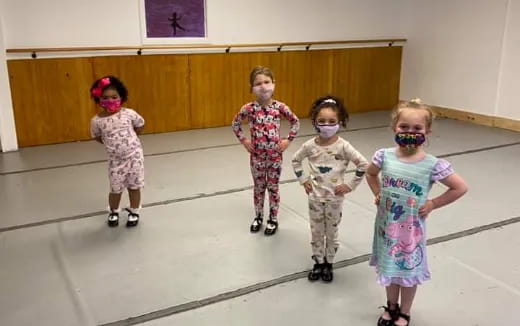 a group of children wearing clothing