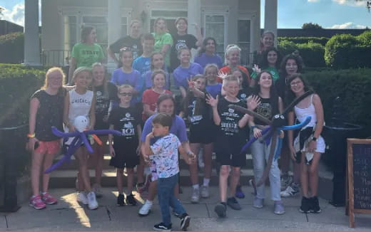 a group of people posing for a photo