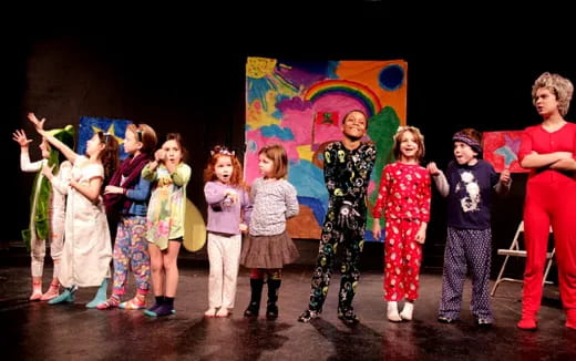 a group of children on a stage