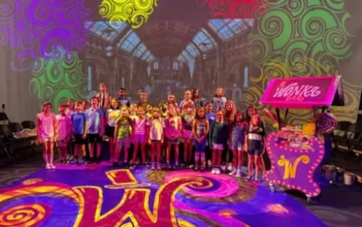 a group of people posing for a photo