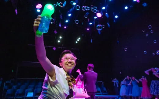 a man holding a bottle of water