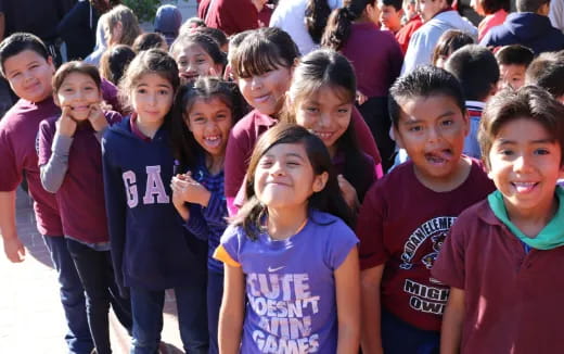 a group of children posing for a photo