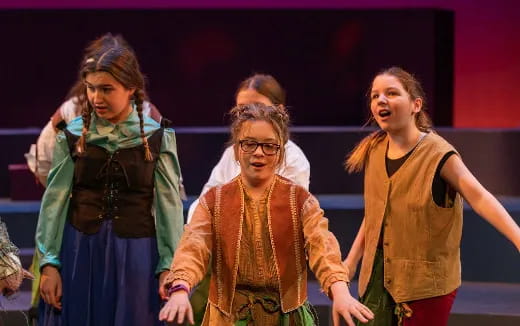 a group of women in clothing