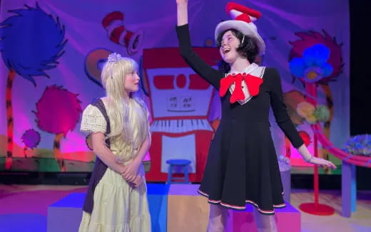 a couple of women wearing clothing