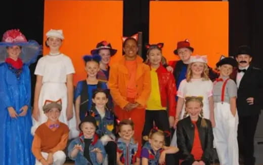 a group of people posing for a photo