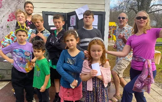 a group of people posing for a photo