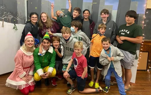 a group of people posing for a photo