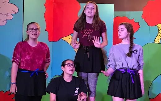 a group of people posing for the camera