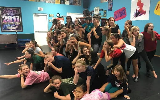 a group of people posing for a photo