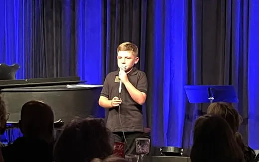 a person holding a microphone