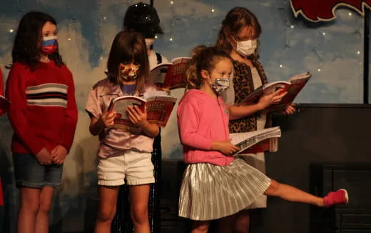a group of girls in a room