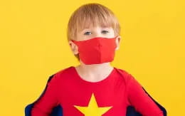 a boy wearing a red shirt